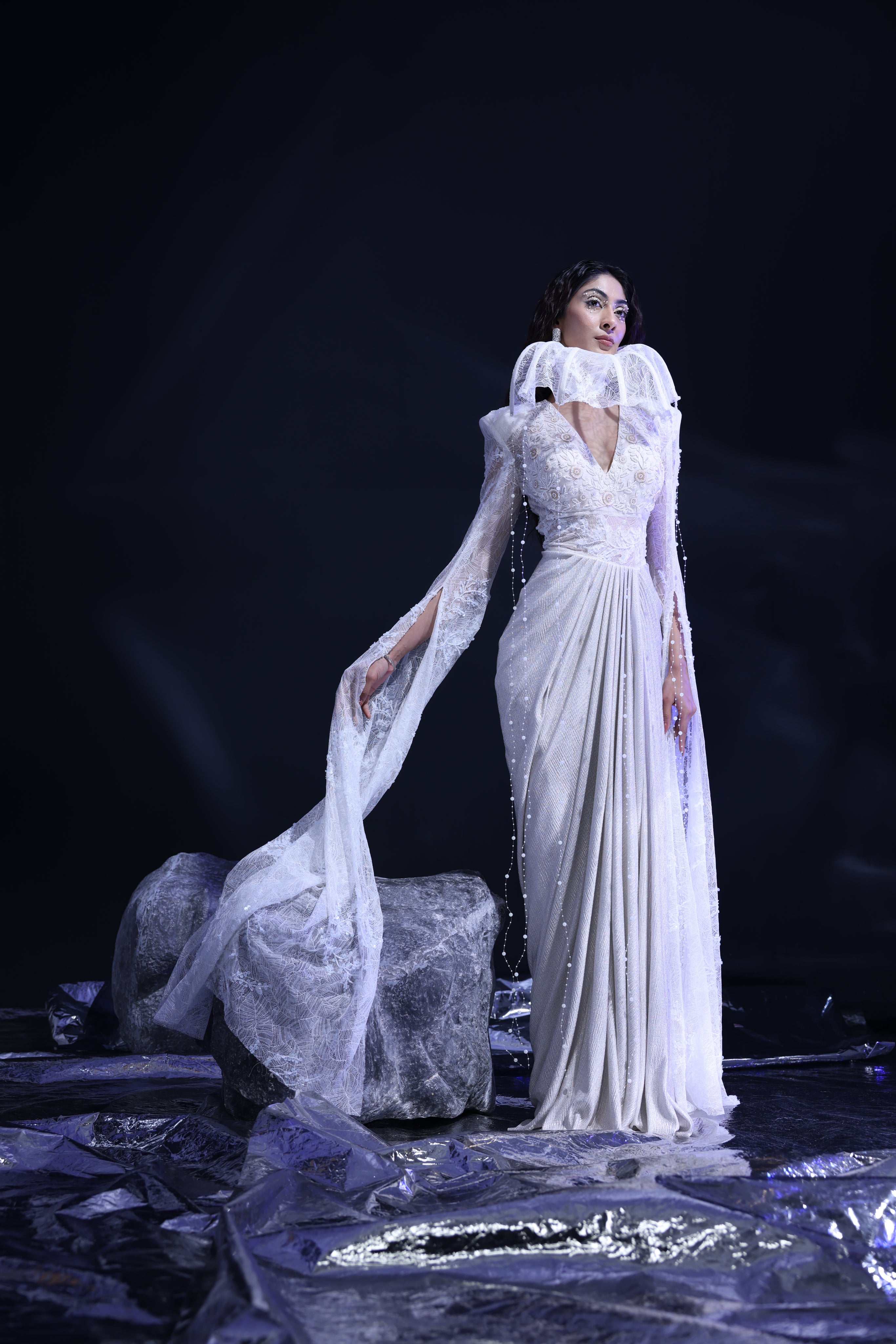 Ivory cape sleeve draped saree