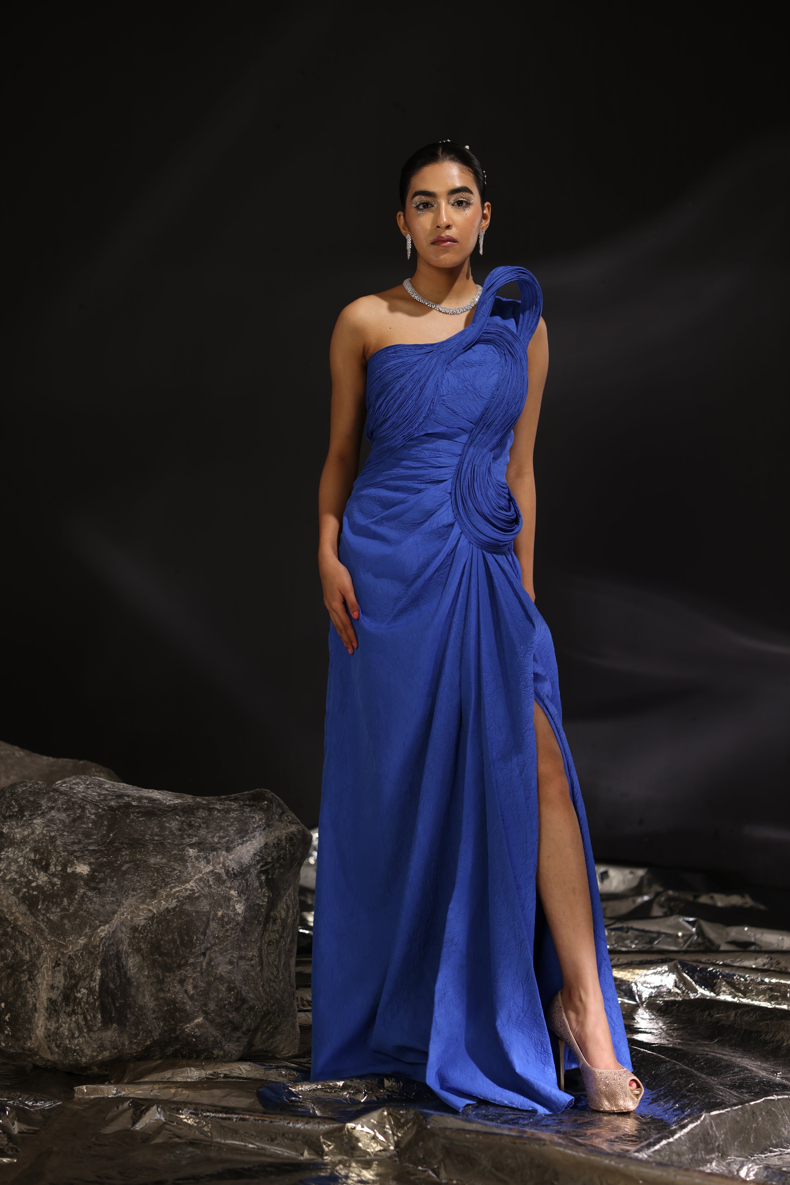 Abyss blue one shoulder sculpted gown