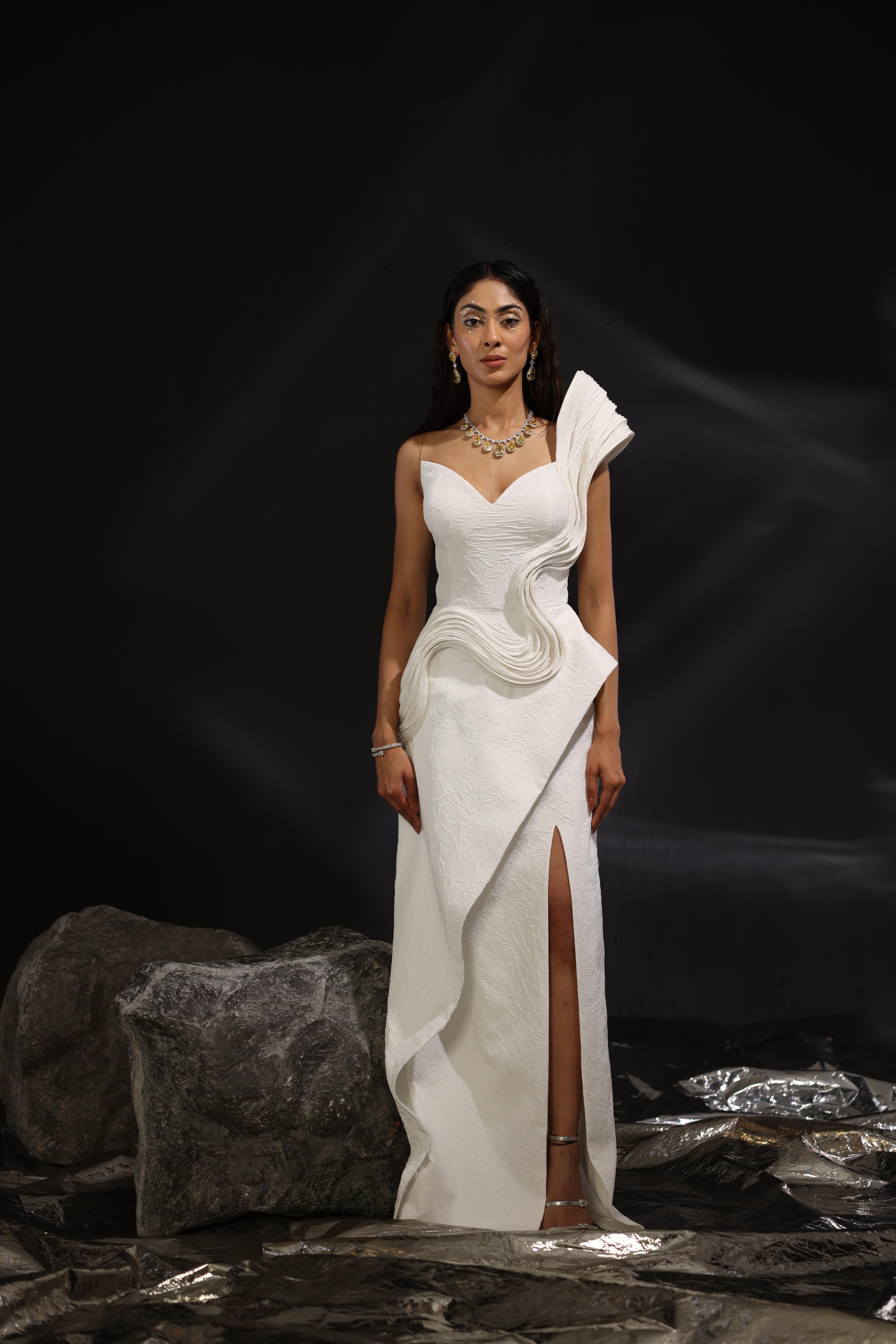 Ivory one shoulder sculpted gown