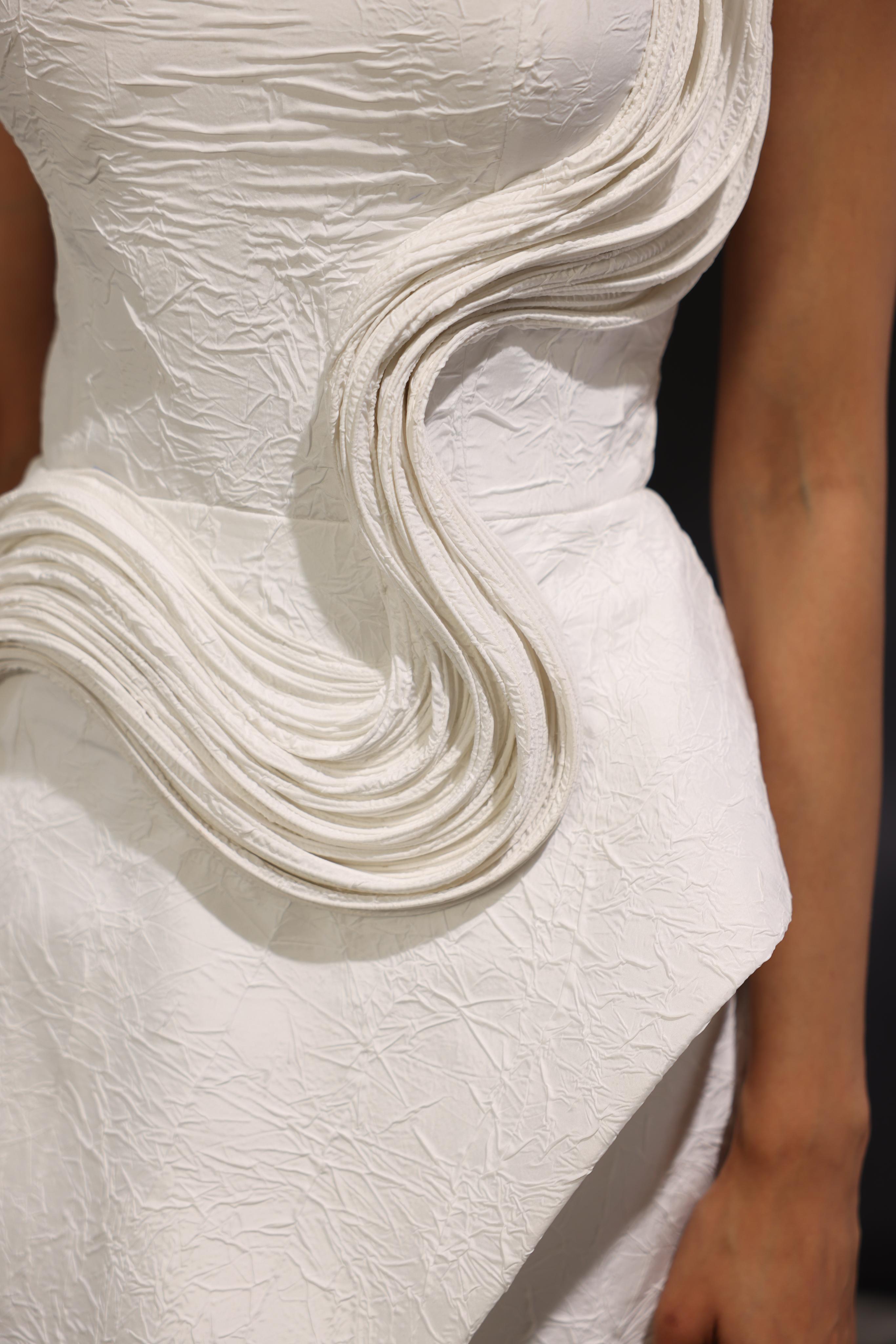 Ivory one shoulder sculpted gown