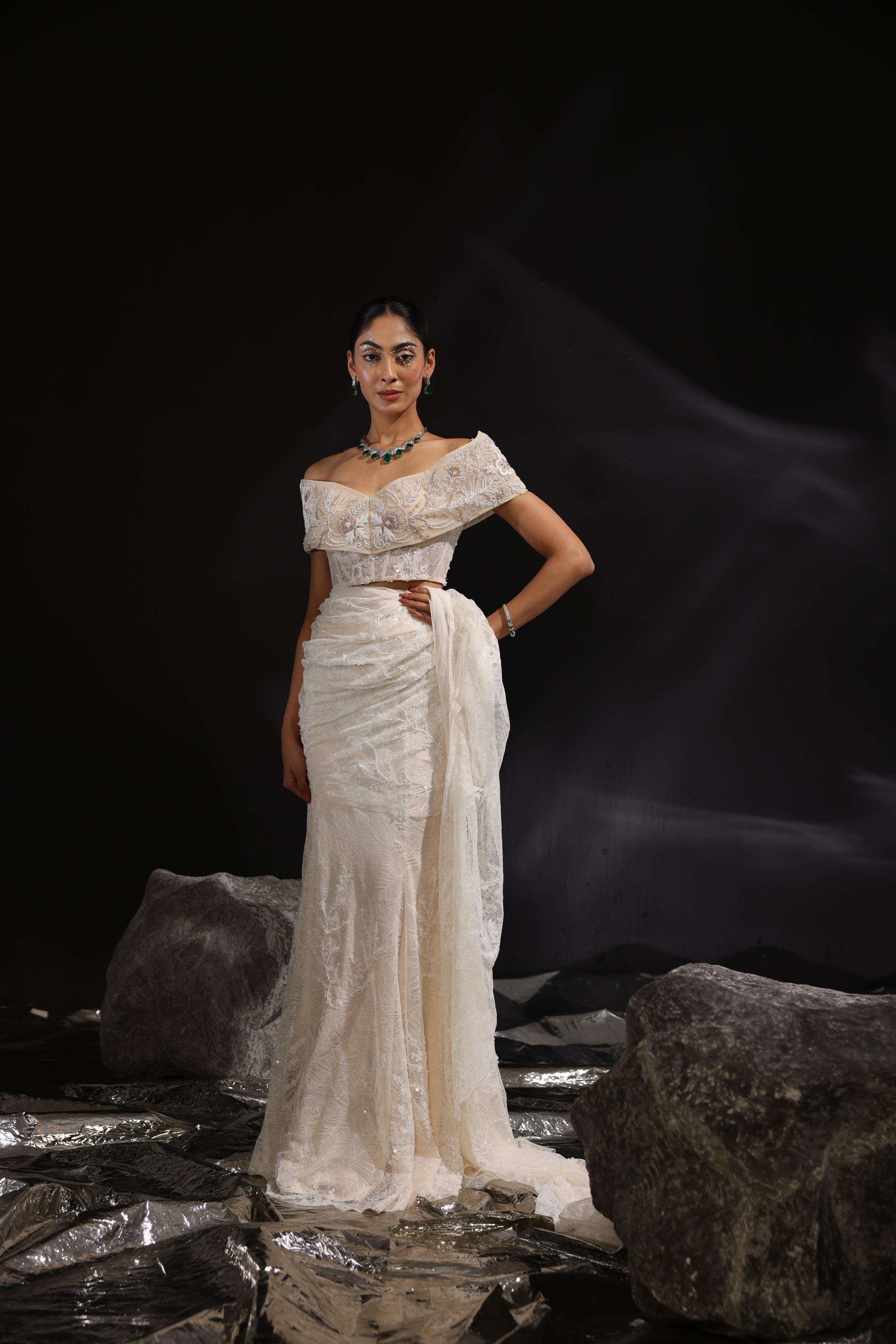 Ivory off shoulder pre-draped fish cut saree