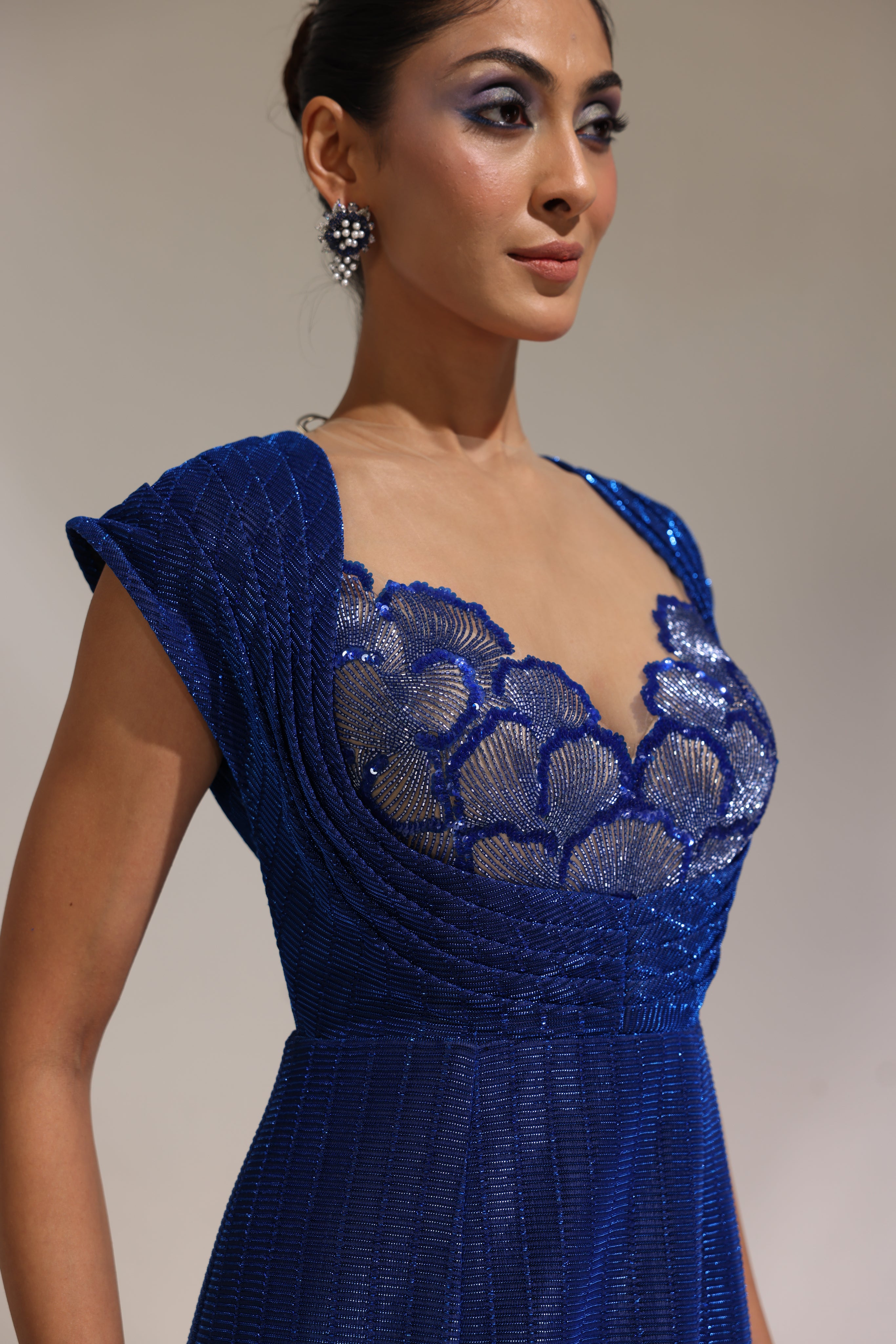 Sapphire power shoulder embroidered gown