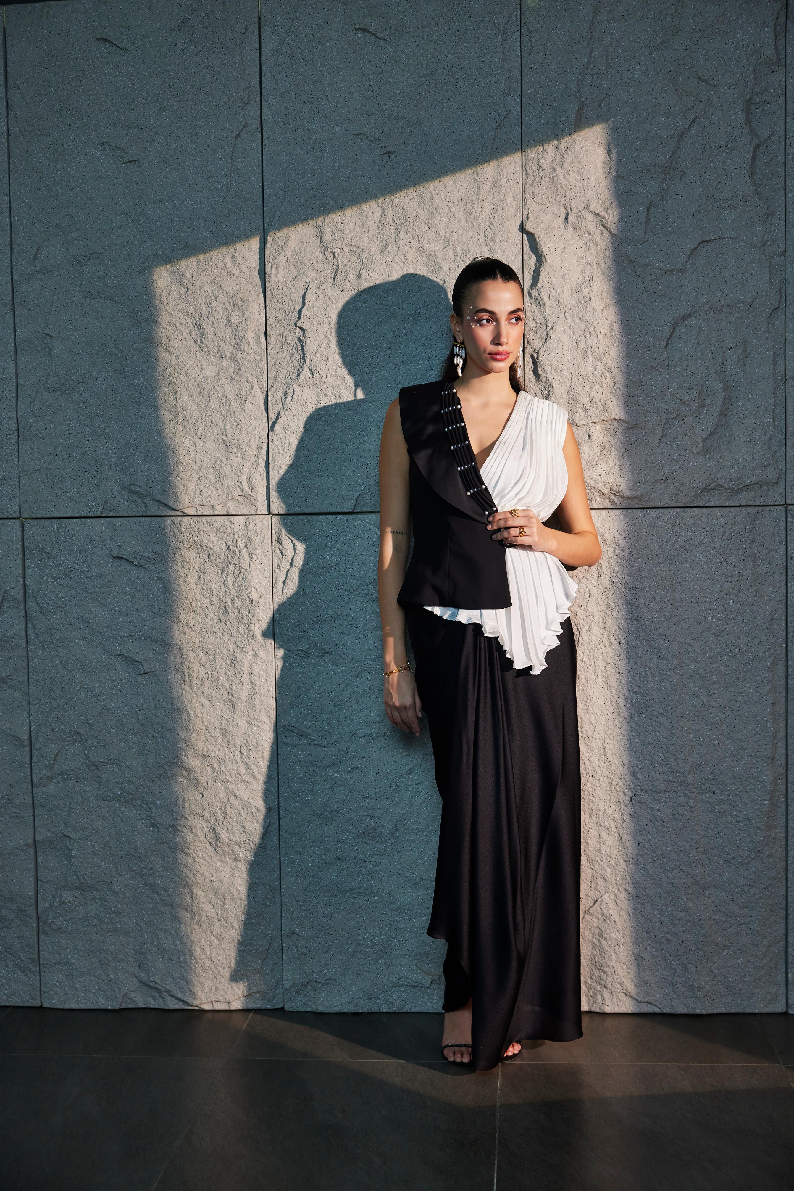 Rich Black & Ivory Semi Drapped  Top With Asymmetrical Skirt