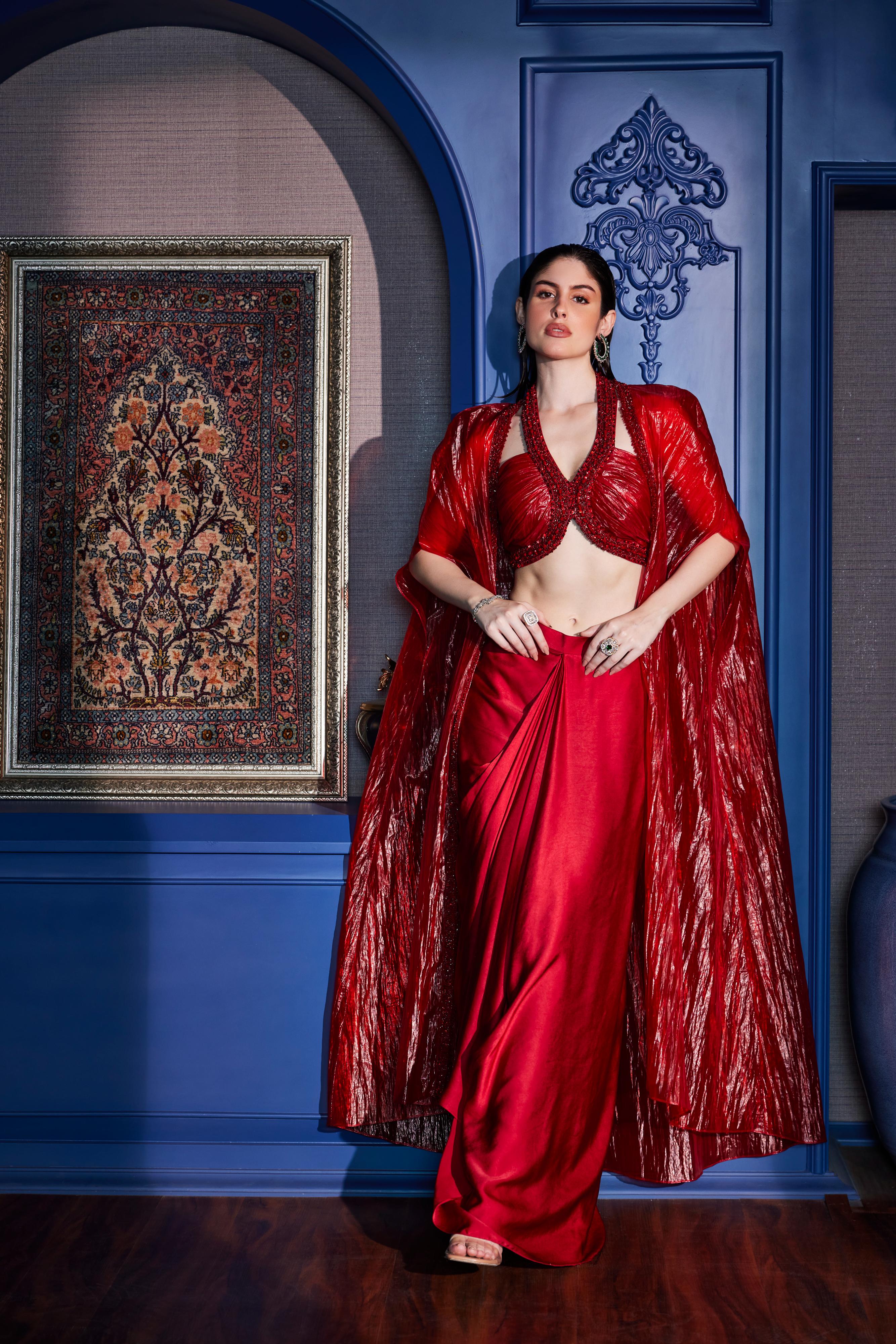 Scarlet Red Halter Neck  Blouse With Asymmetrical Skirt & Sheer Cape