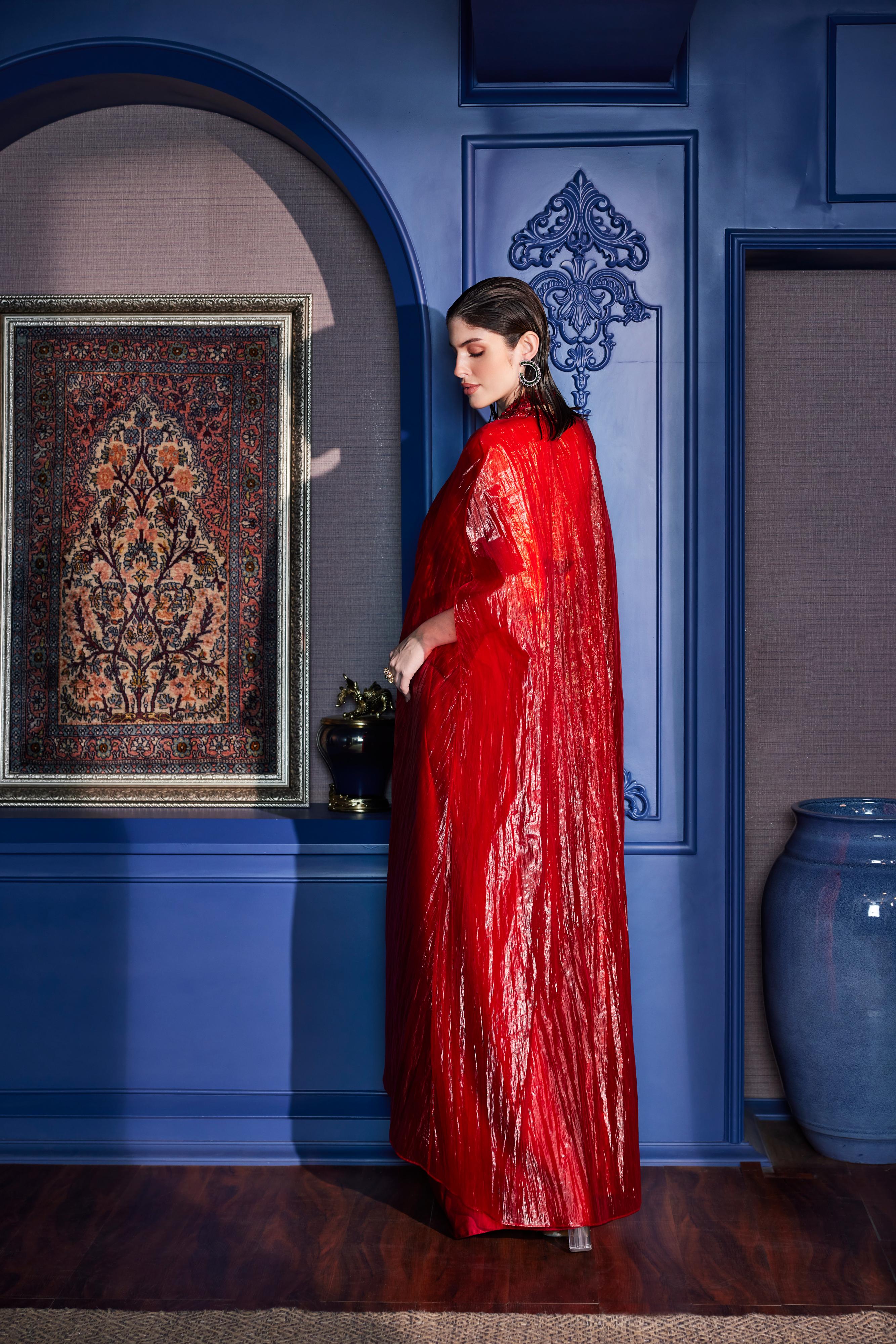 Scarlet Red Halter Neck  Blouse With Asymmetrical Skirt & Sheer Cape